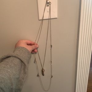 Gold layered necklace from Express. Leaf details with long layers.